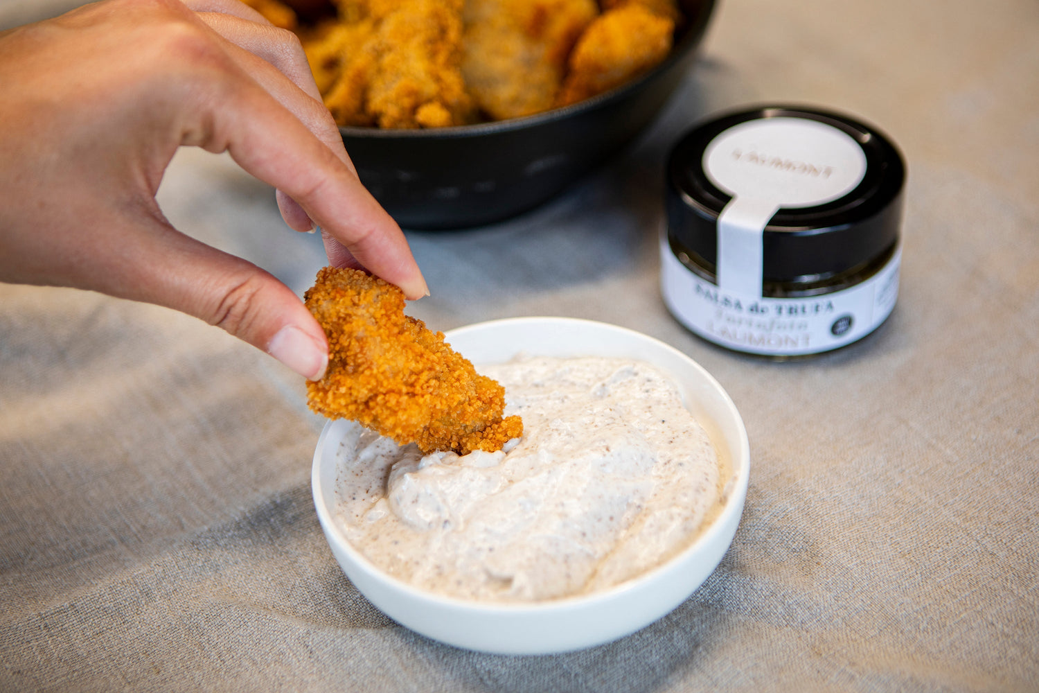 Fingers de pollo con salsa tartufata